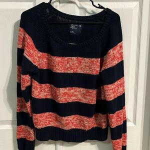 Women’s lightly worn blue, red, and white cardigan sweater